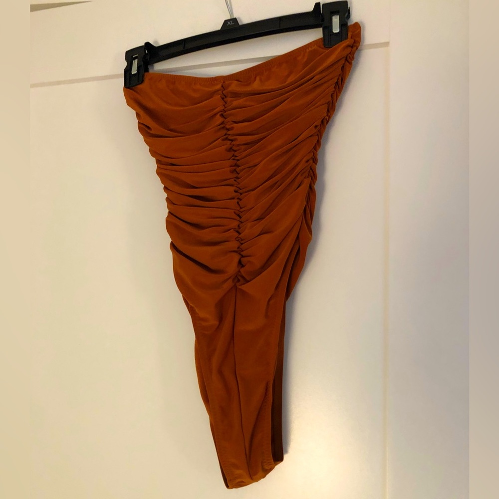 Strapless bodysuit by Norma Kamali